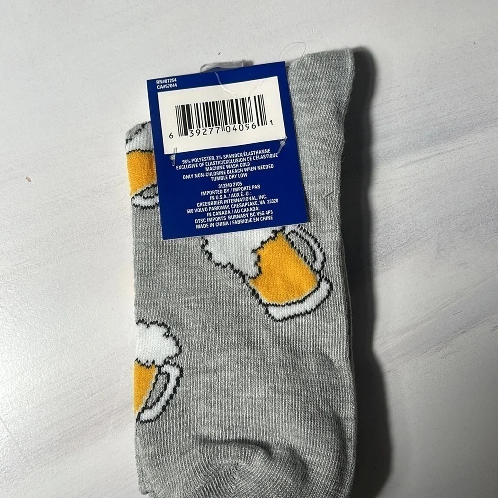 4 pairs of men socks. Football. Top Ramen. Beer. Lemur size 6-12